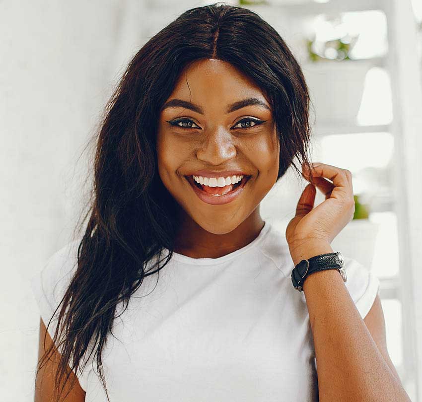 Smiling woman in a white T-shirt